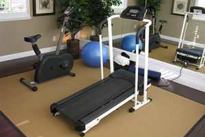 Image of small exercise room with various machines