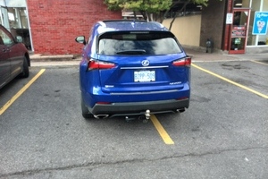 Image of inconsiderate asshole taking up two parking spots