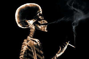 Image of skeleton smoking cigarette and blowing smoke rings